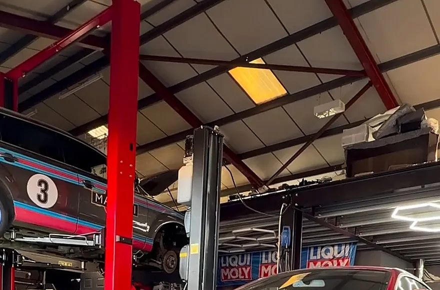 Our workshop: cars on the red lifts